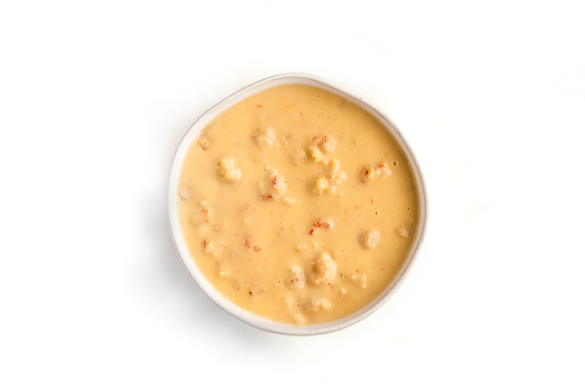 An aerial shot of a bowl of lobster bisque