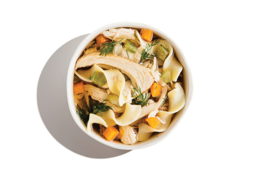 Small chicken soup portion, with carrots and noodles