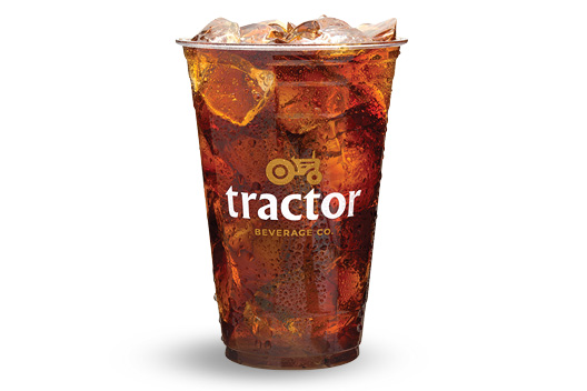 Unsweetened Black Tea in a clear plastic cup, with ice cubes