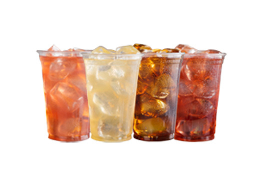 4 cups of different craft beverages with ice