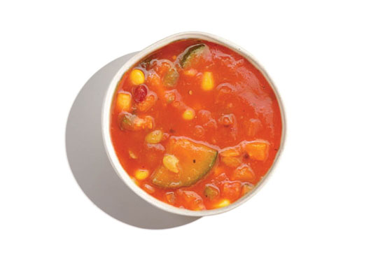Hearty vegetable soup with corn, zucchini, and beans in a tomato base.