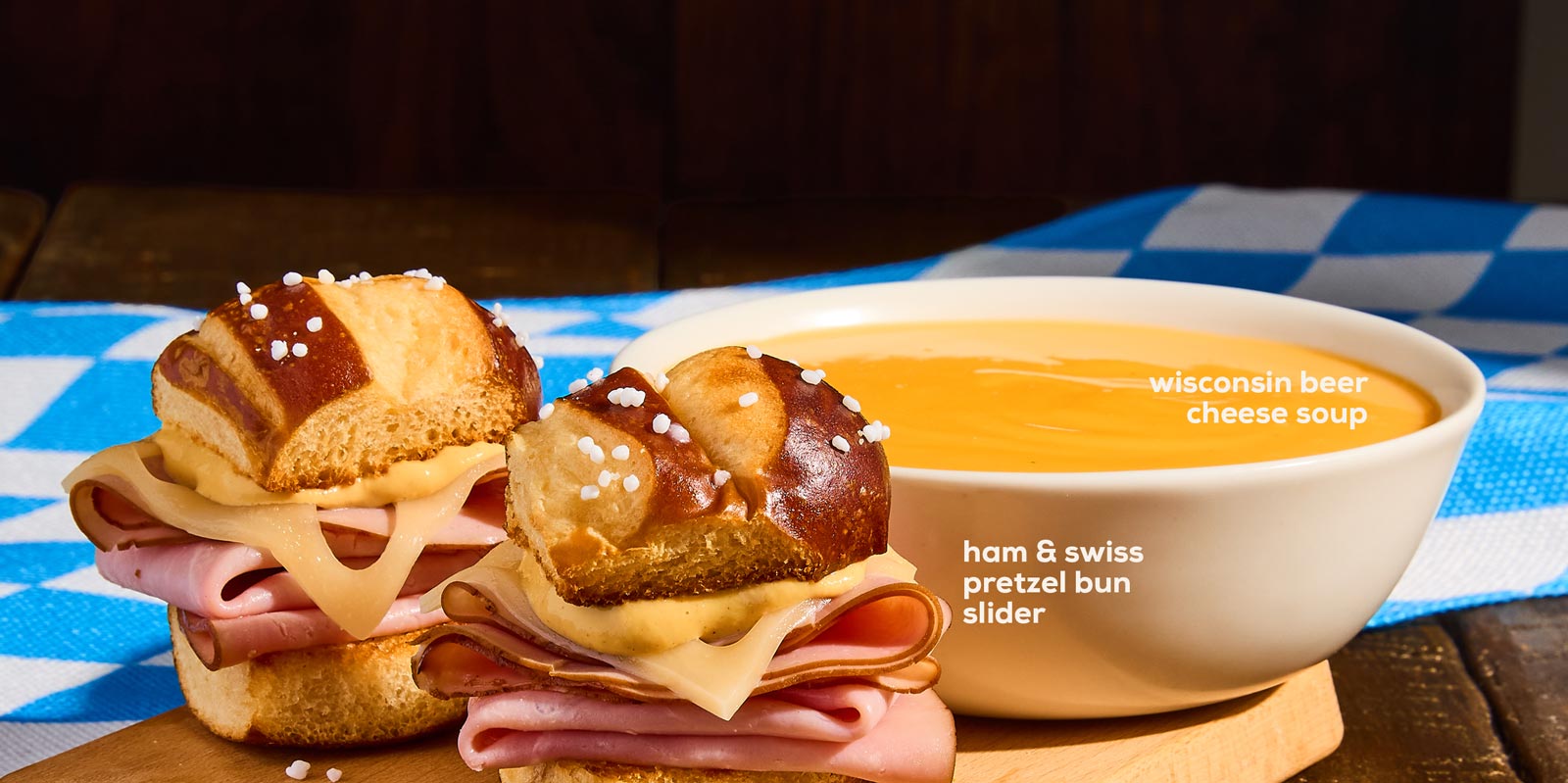 ham & swiss pretzel bun slider with wisconsin beer cheese soup